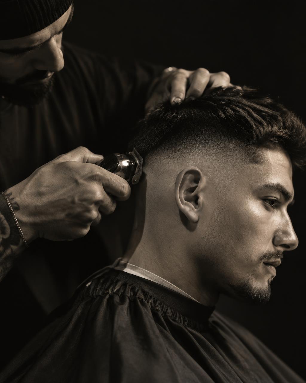 Barber cutting a skin fade